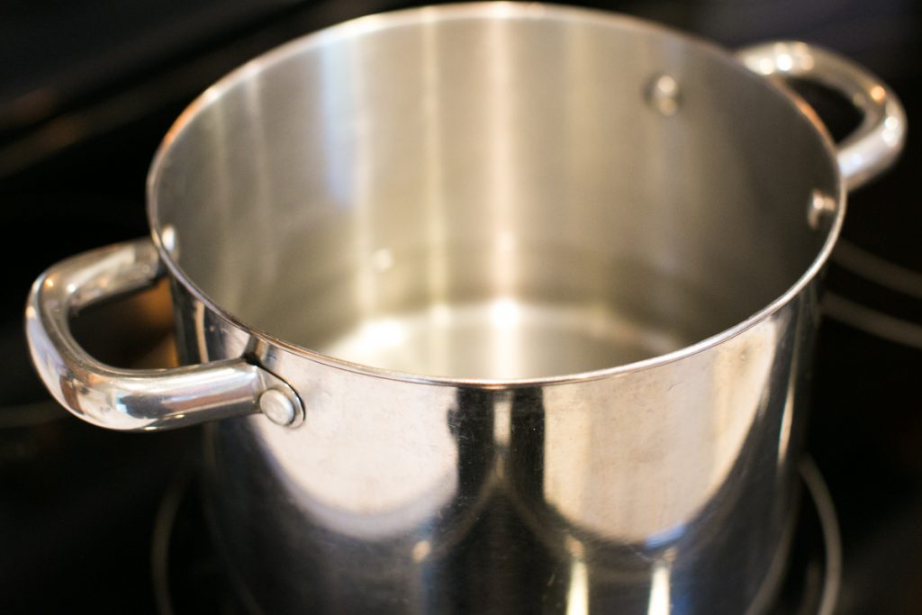 Add 2-3 inches of water into a large pot to boil farm fresh eggs within. 