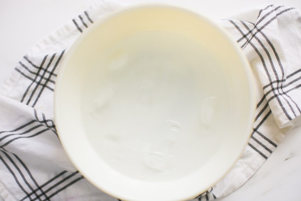 Prepare an ice bath for hard boiled farm fresh eggs to cool in.  Add eggs into cold water bath after boiling. 