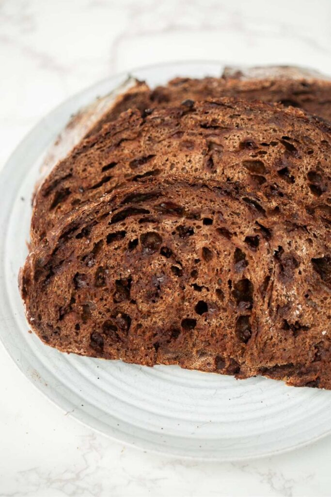 double chocolate sourdough bread sliced on a plate