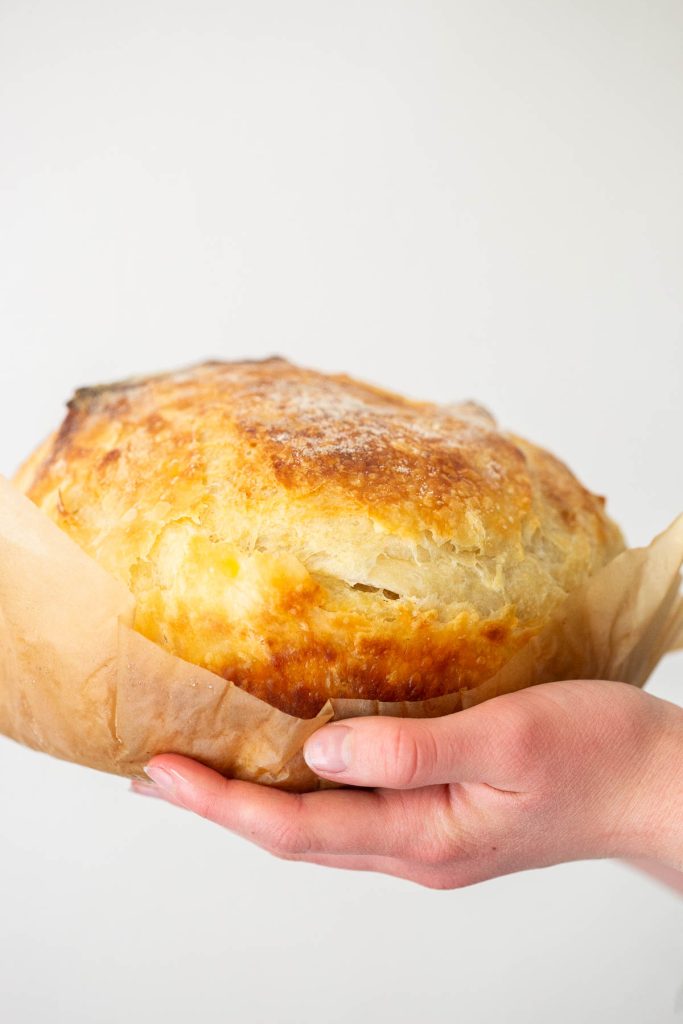 sourdough croisssant loaf wrapped in parchment paper