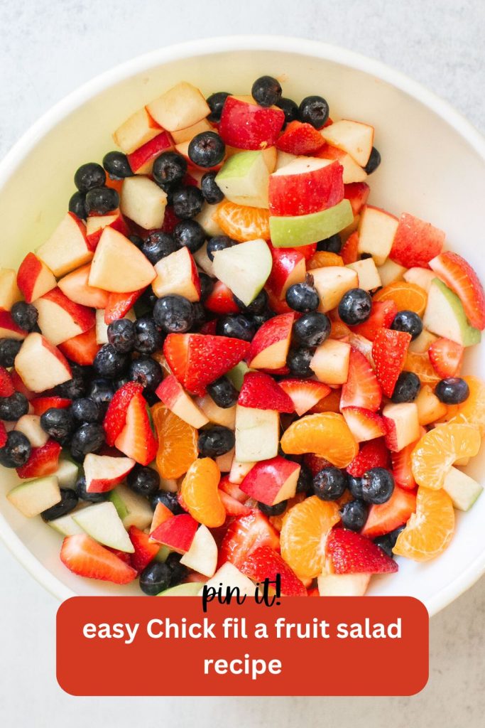  a pinterest pin with a photo of chick fil a fruit salad in a cup: blueberries, strawberries, apples, and oranges