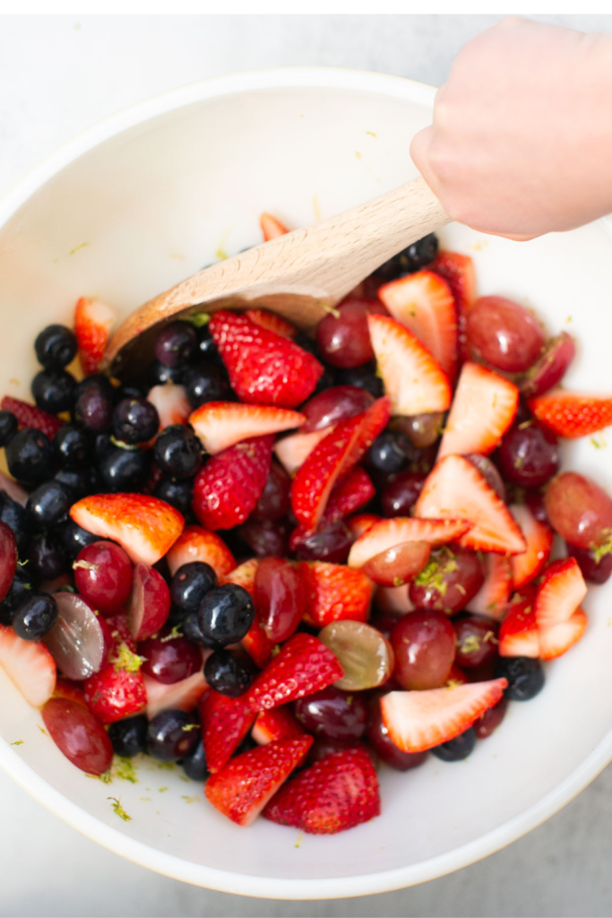 honey lime fruit salad with berries, strawberries and grapes