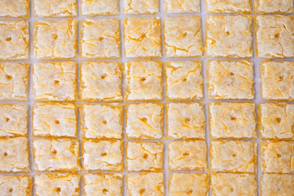 sourdough discard cheese crackers on a baking sheet