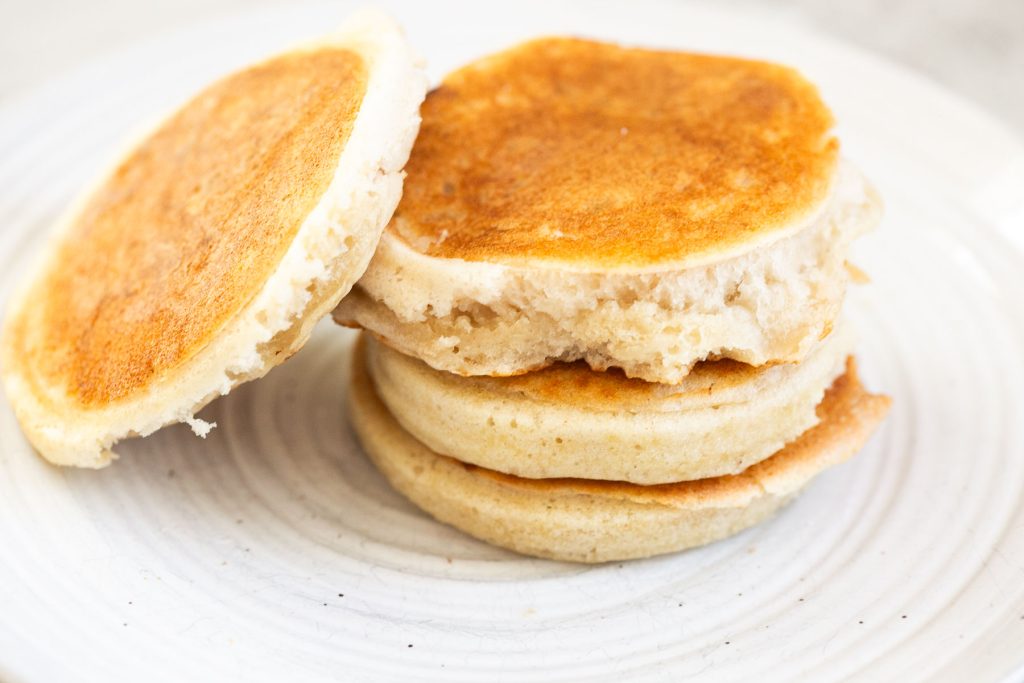 sourdough pikelets in a stack