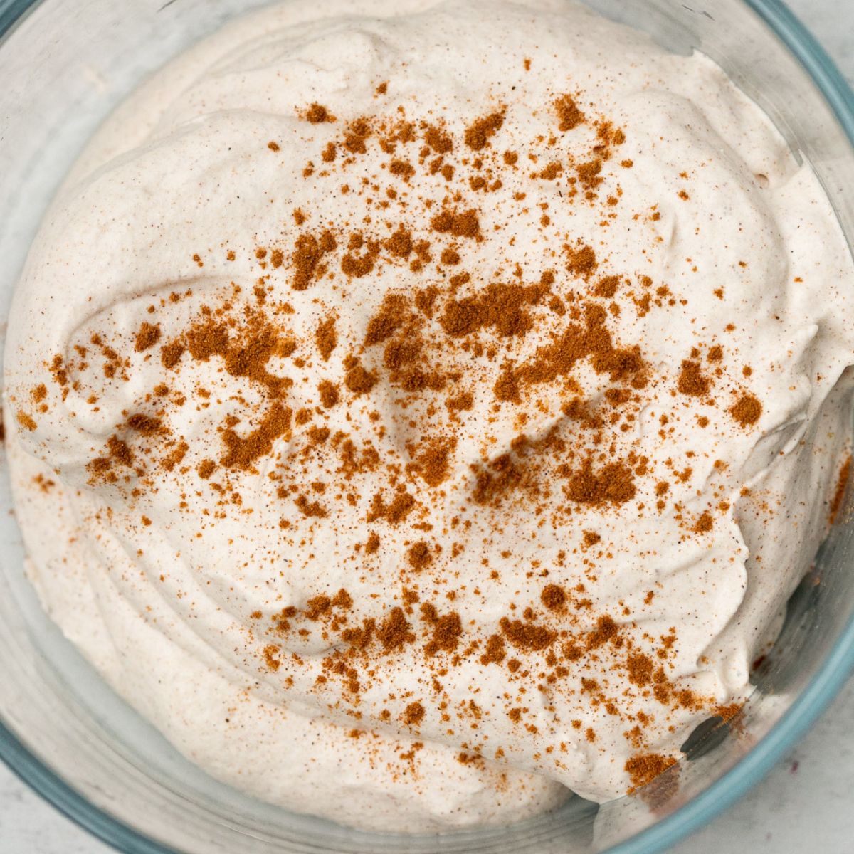 homemade pumpkin spice whipped cream in a bowl