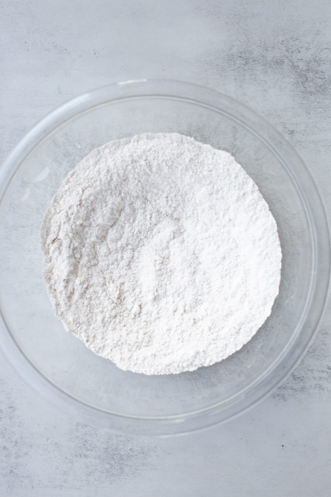 dry ingredients for pumpkin streusel muffins in a small bowl