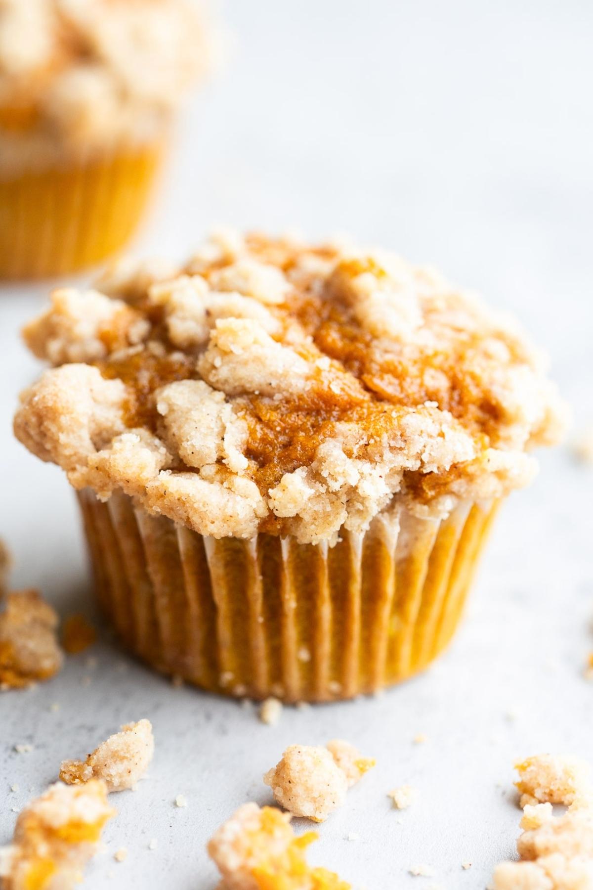 sourdough discard pumpkin streusel muffins on a tray.