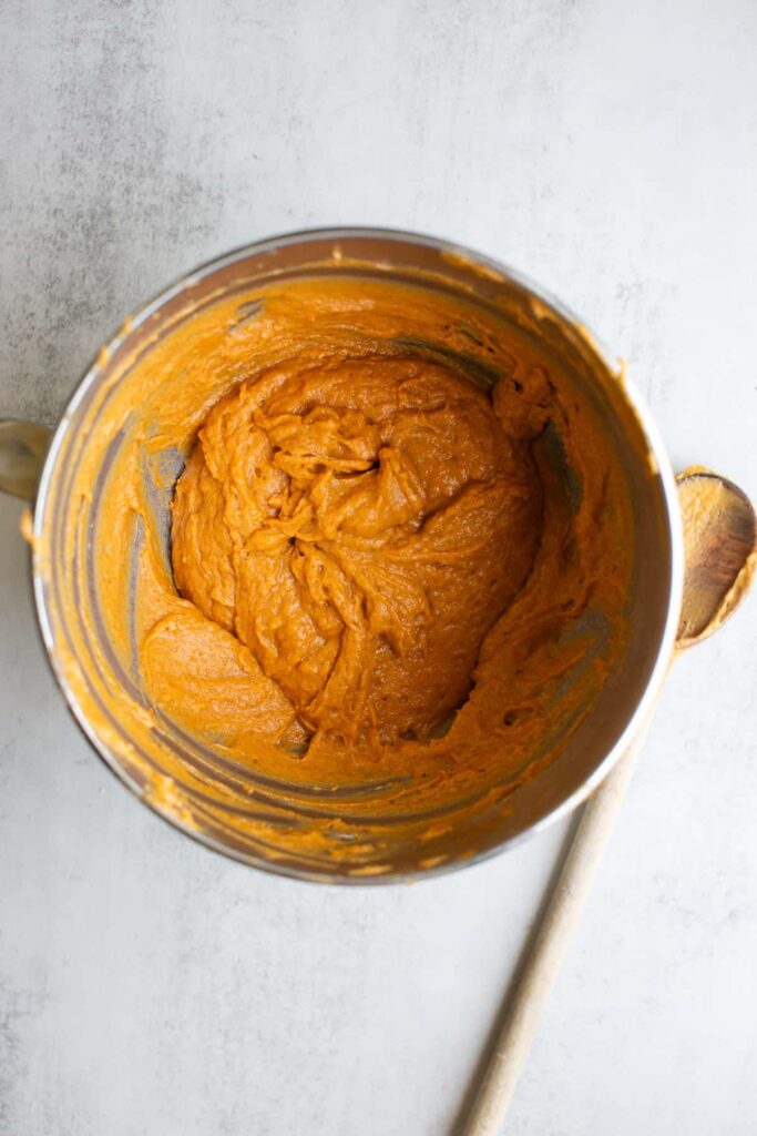 batter for pumpkin streusel muffins in a stand mixer.