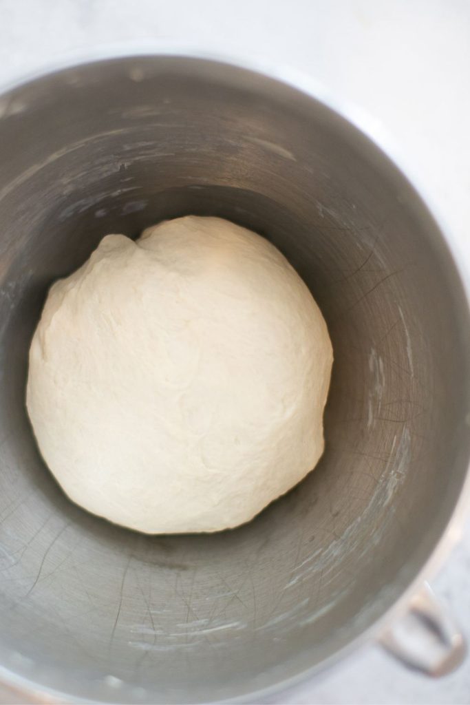 dough for sourdough discard sandwich bread in the bowl of a stand mixer
