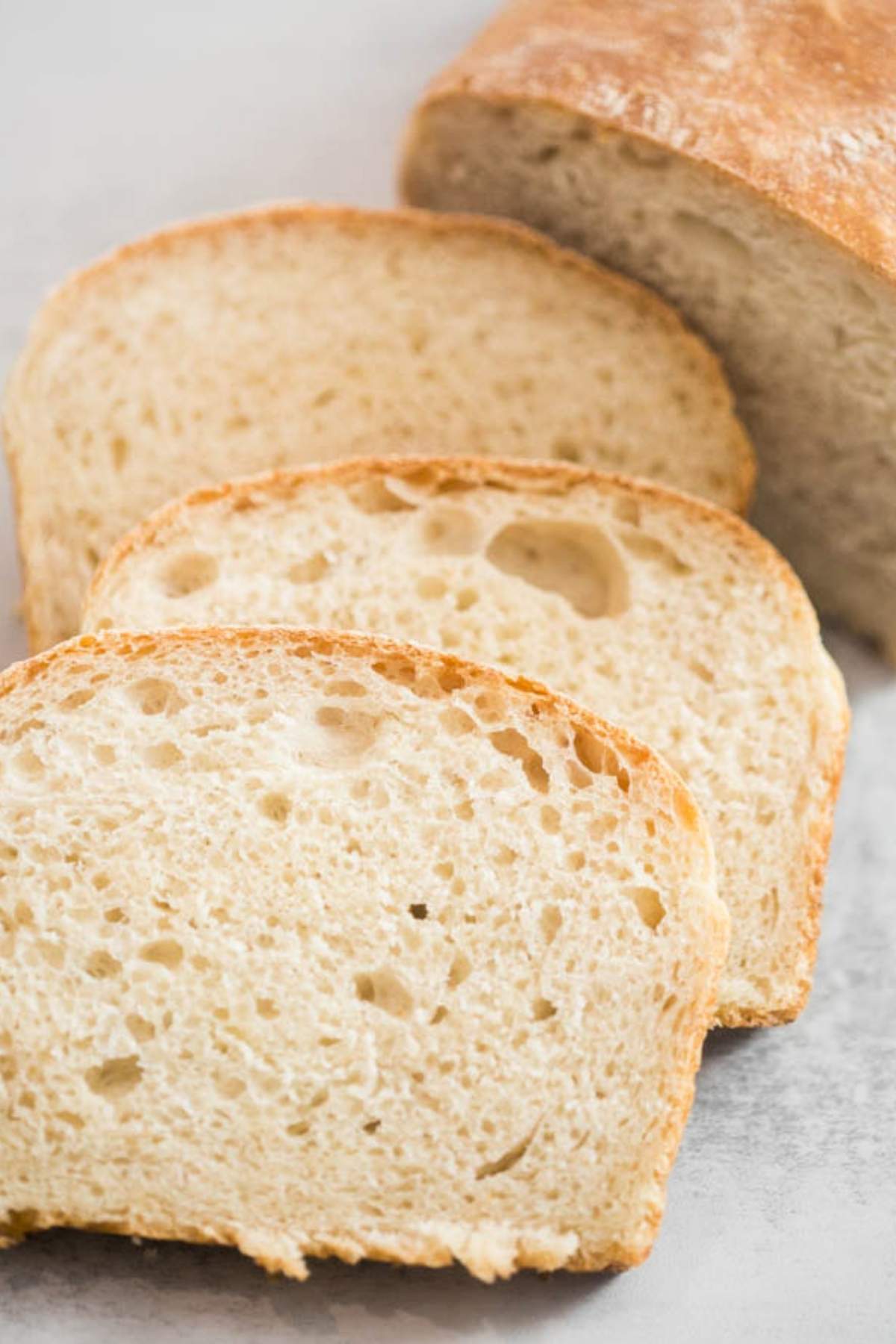 Soft and fluffy sourdough sandwiches on a plate. 