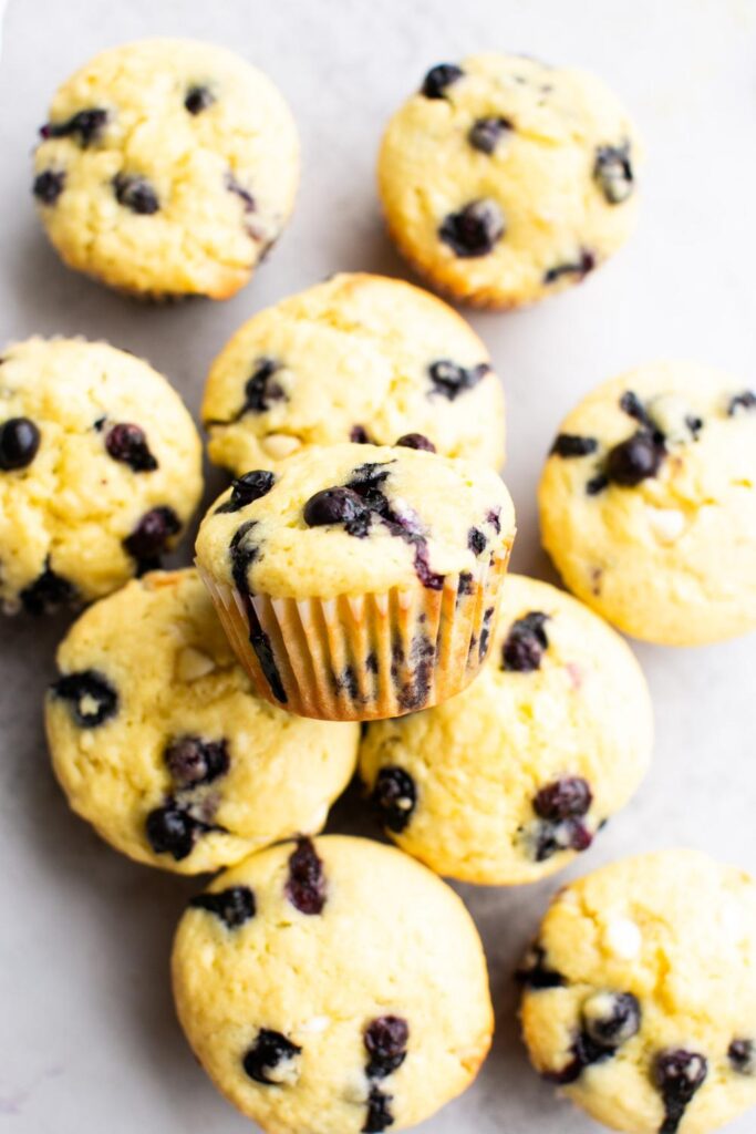 sourdough discard blueberry white chocolate chip muffins on a table