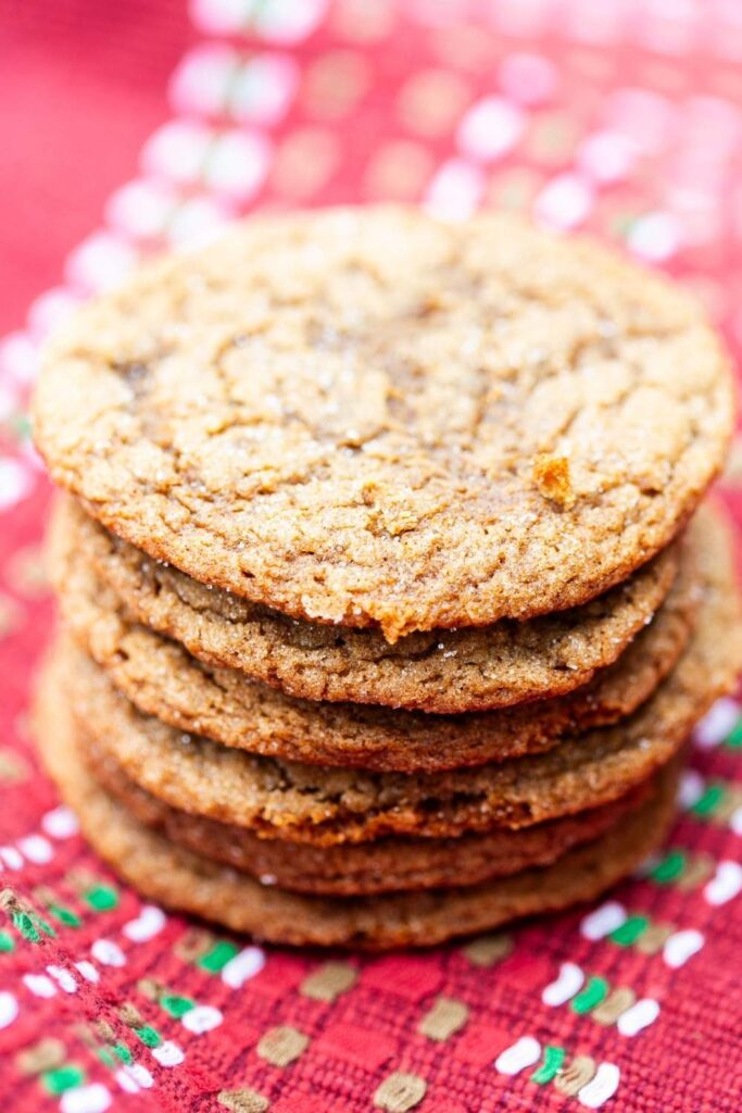 a stack of old fashioned gingersnap cookies on a tray