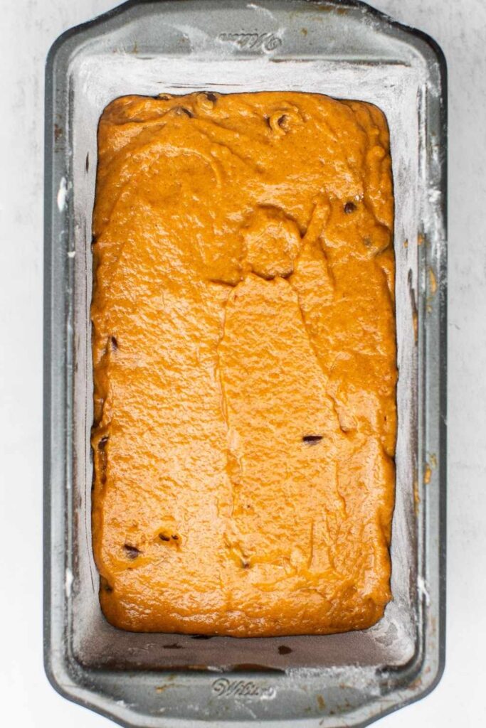 dough for chocolate chip pumpkin bread in a pan