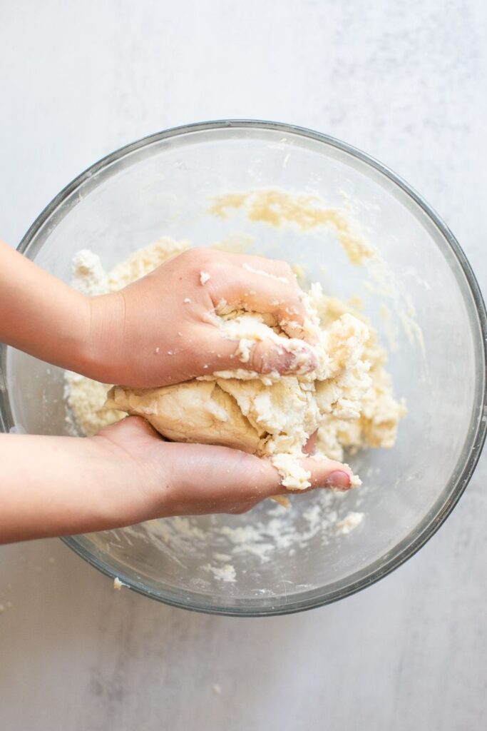 pie dough being formed into a loose ball
