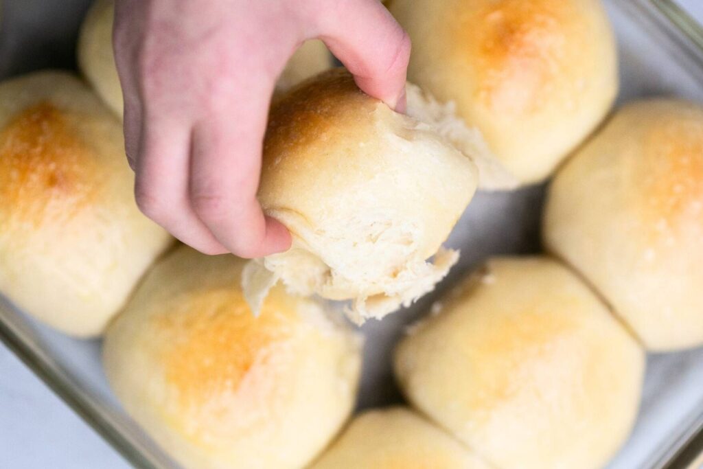 tear apart sourdough rolls in a pan