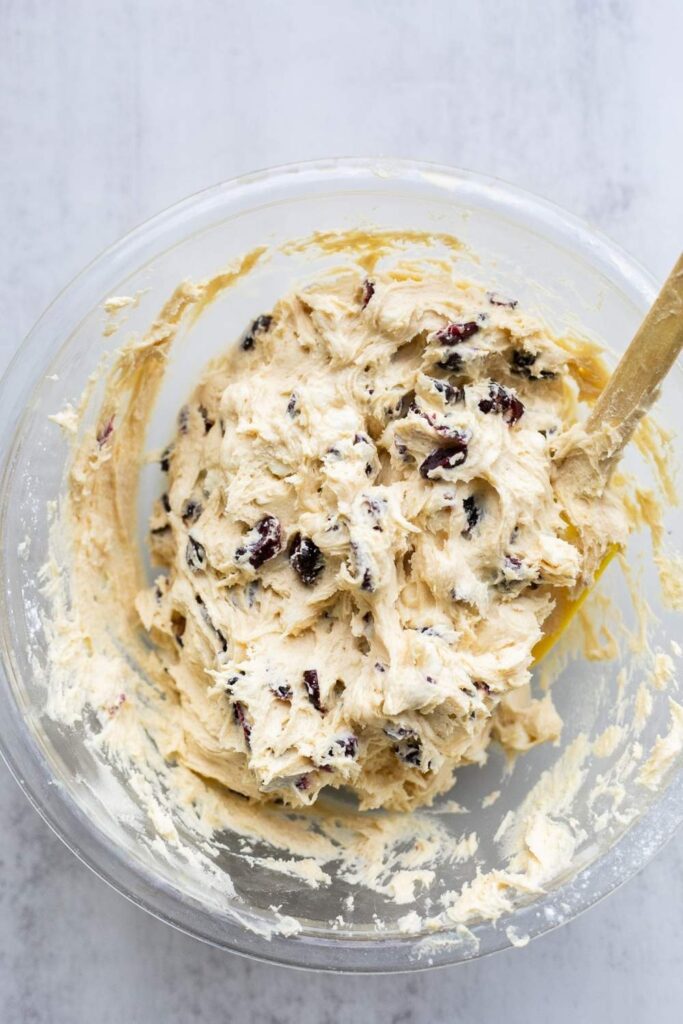 sourdough cranberry white chocolate chip cookie dough in a bowl