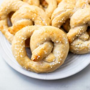 homemade overnight sourdough pretzels on a plate