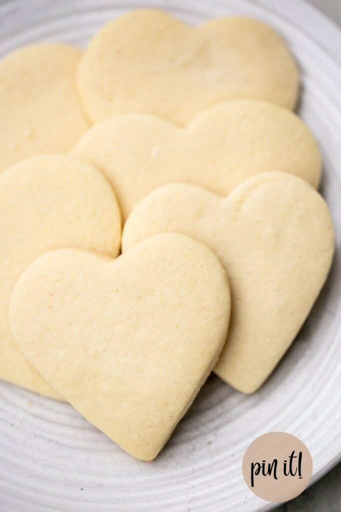 thick heart shaped cut out sourdough discard sugar cookies on a plate