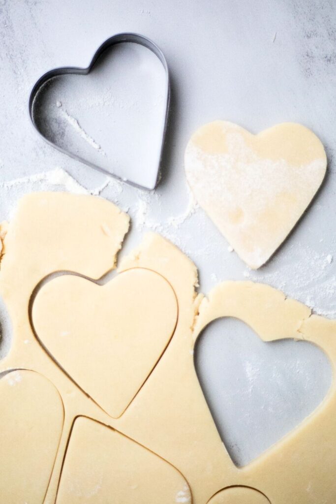 sourdough sugar cookies cut out on a tray