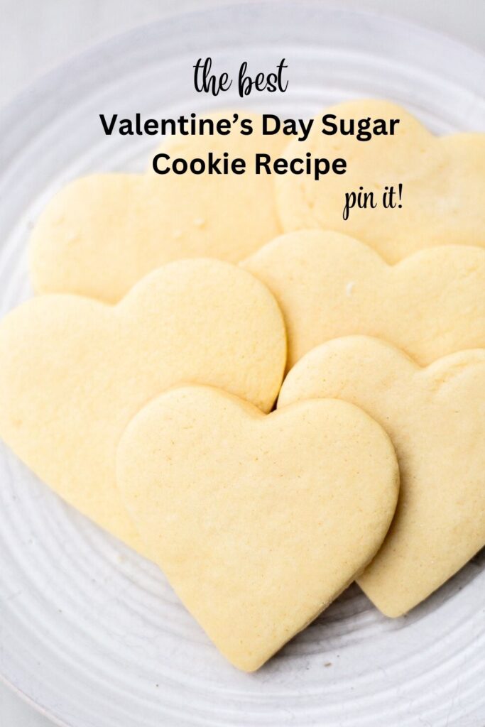 a pinterest pin with a photo of heart shaped sugar cookies for valentine's day on it