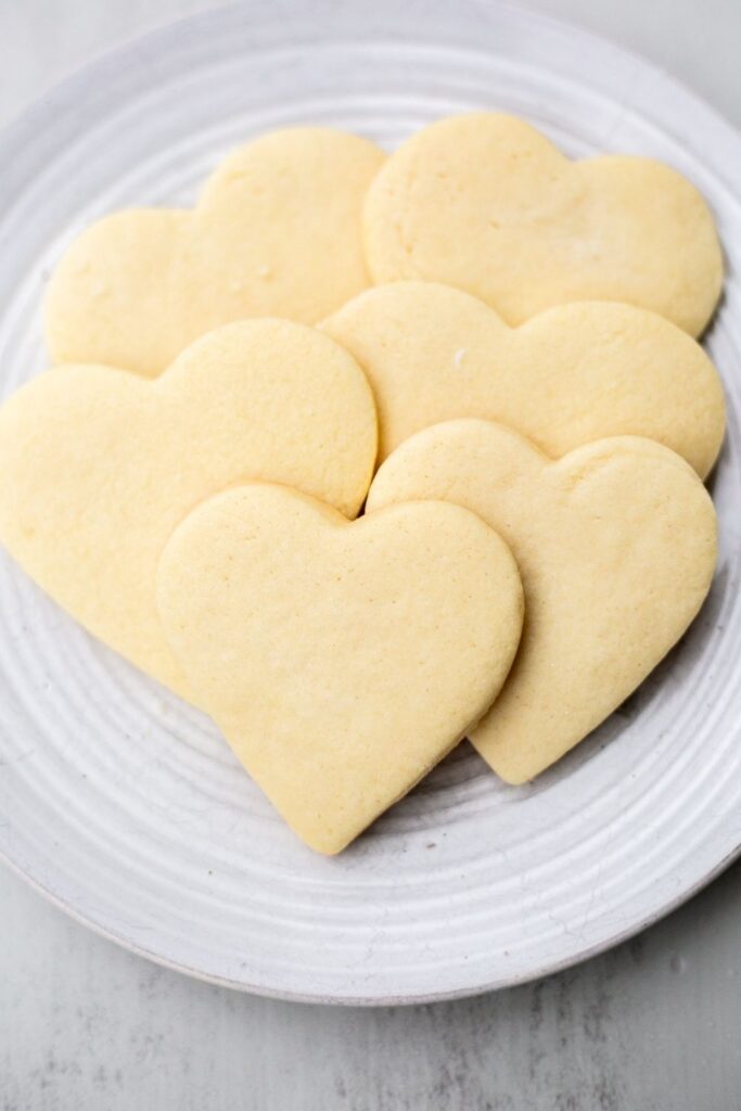 heart shaped valentines day sugar cookies on a tray