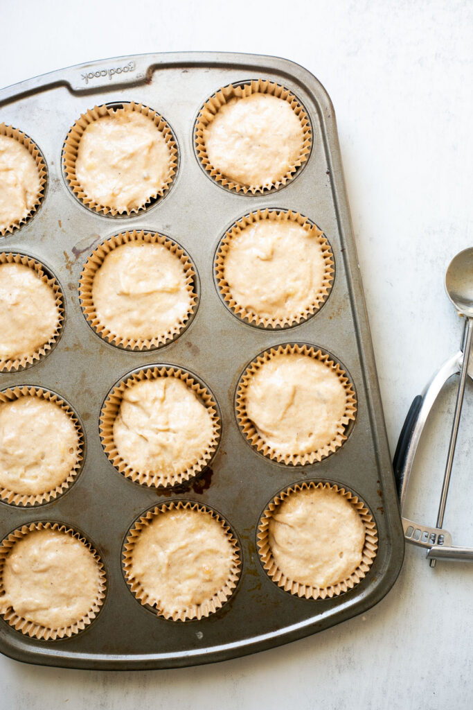 sourdough discard muffin batter in a muffin tin