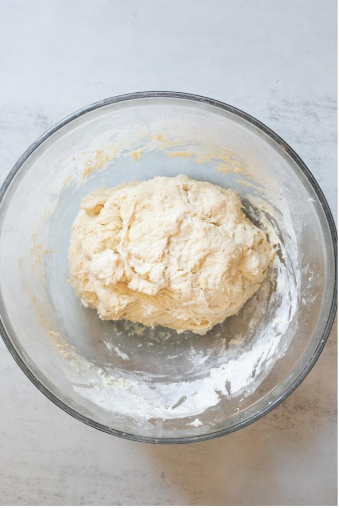 dough for sourdough cinnamon swirl sandwich bread in a bowl