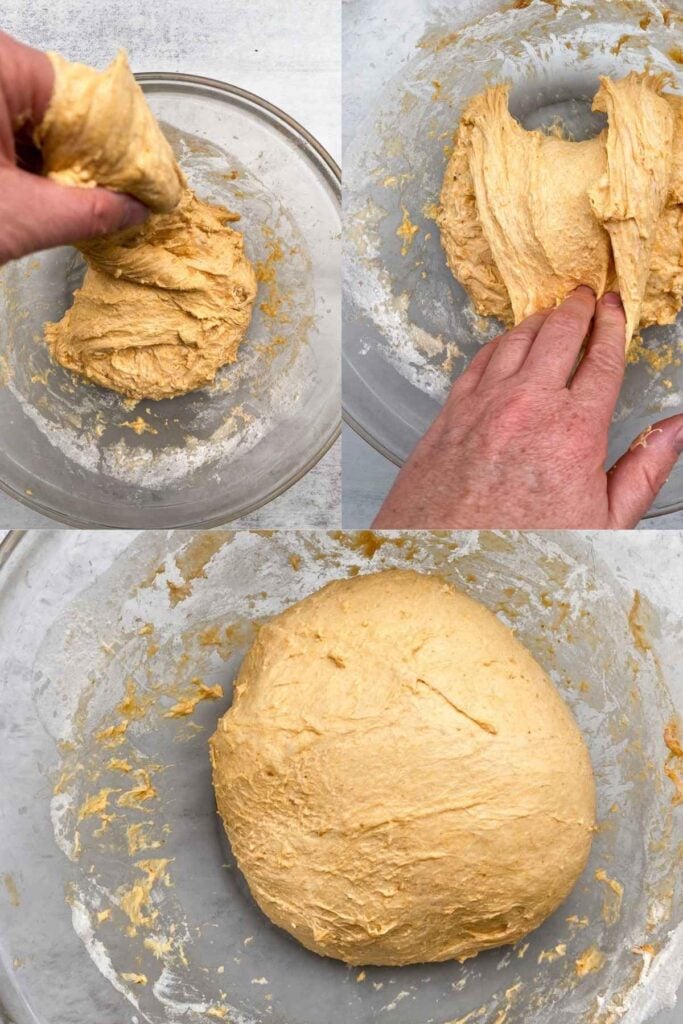 Sourdough artisan pumpkin bread being given stretch and folds in a large bowl.
